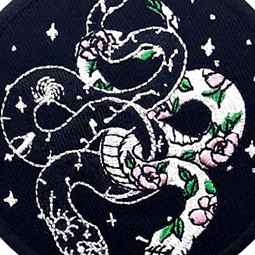 הנחשים הלבנים והשחורים עם פרחים וטלאי חלל רקום ברזל על תפירה על סמל